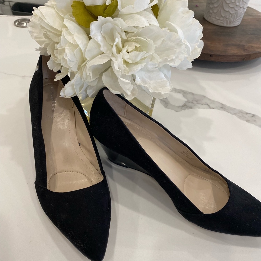 Calvin Klein beautiful suede like wedge heel. Size 8 been worn once.